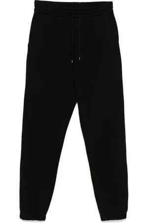 Saint Laurent Pants con logo Cassandre