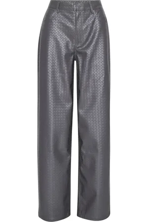 ROTATE Pantalones con diseño trenzado
