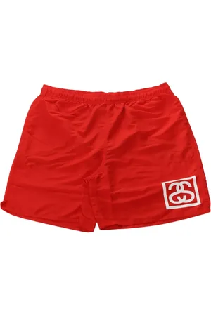 STUSSY Shorts de playa con logo estampado