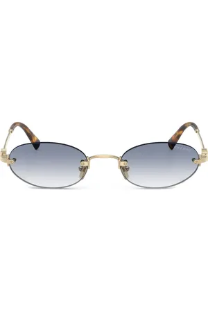 Miu Miu Lentes de sol con armazón ovalada
