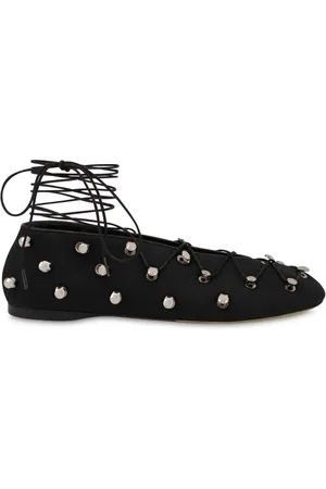 Moschino Flats con detalle de ojales