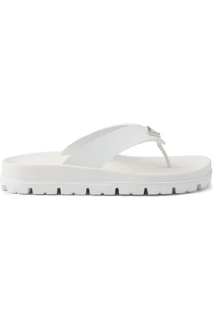 Prada Flip flops con logo triangular