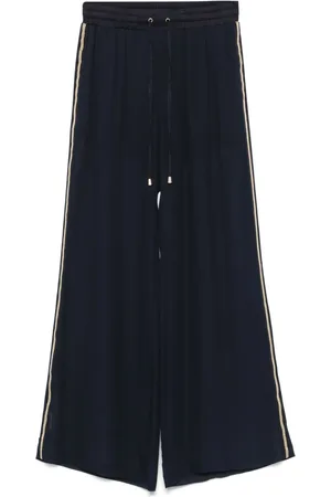 Ermanno Firenze Pantalones con rayas laterales