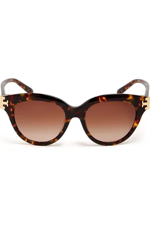 Tory Burch Lentes de sol con armazón estilo carey
