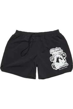 Acne Studios Shorts de playa con estampado gráfico
