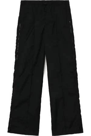 TOGA PULLA Pantalones con detalle de cierres
