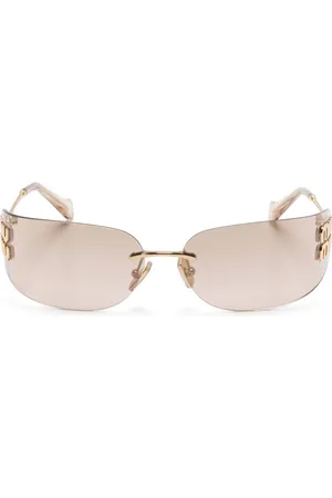 Miu Miu Lentes de sol con placa del logo