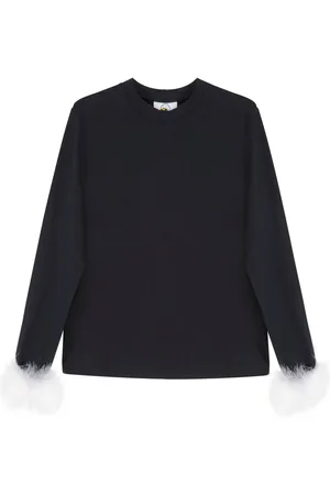 Sleeper Playera con detalle de plumas