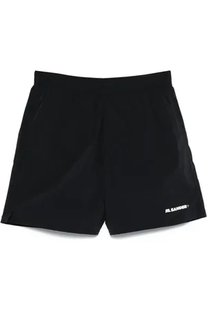 Jil Sander Shorts de playa con logo estampado
