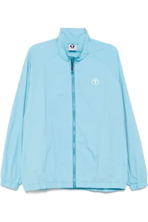 A Bathing Ape Chamarra rompevientos AAPENOW con logo Moonface