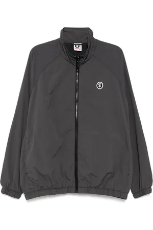 A Bathing Ape Chamarra rompevientos AAPENOW con logo Moonface