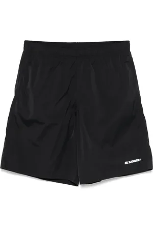 Jil Sander Shorts de playa con logo estampado