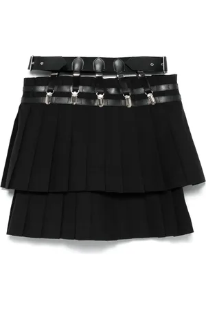 NOIR KEI NINOMIYA Falda corta plisada de x Comme Des Garcons