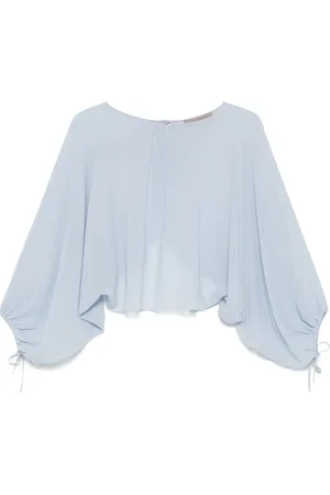 D.EXTERIOR Blusa traslúcida