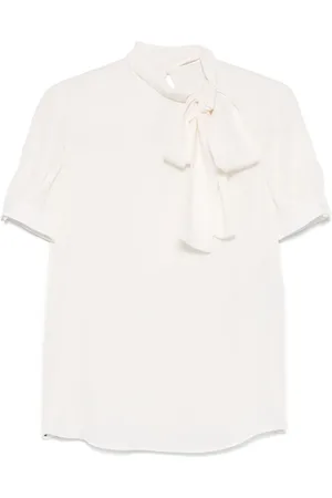 VALENTINO GARAVANI Blusa de seda con moño en el cuello