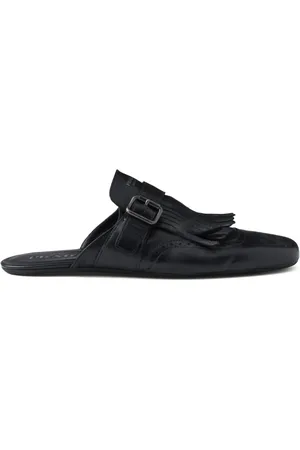 Prada Mules monk con flecos