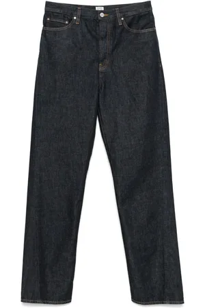 Totême Jeans con costuras retorcidas