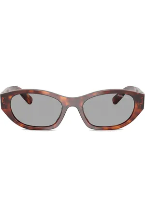 Miu Miu Lentes de sol con armazón estilo carey