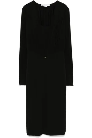 GENNY Vestido corto con cuello en V