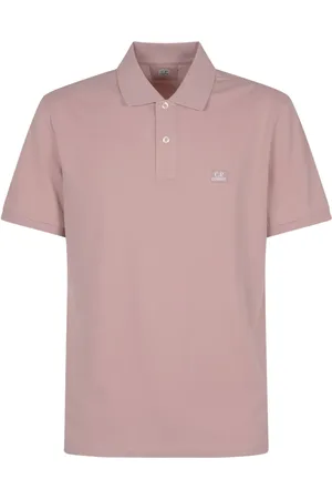 C.P. Company Playera tipo polo con parche del logo