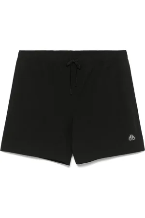 Moose Knuckles Shorts de playa con parche del logo
