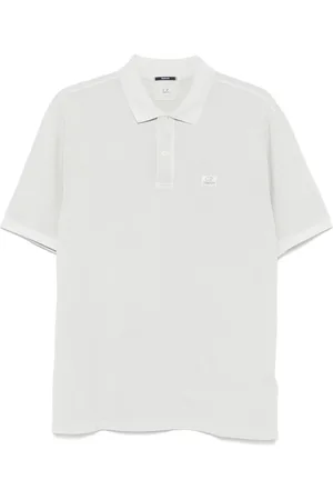 C.P. Company Playera tipo polo con logo bordado