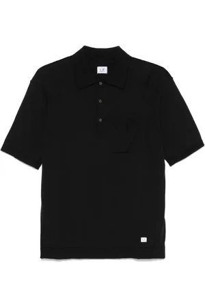 C.P. Company Playera tipo polo con parche del logo