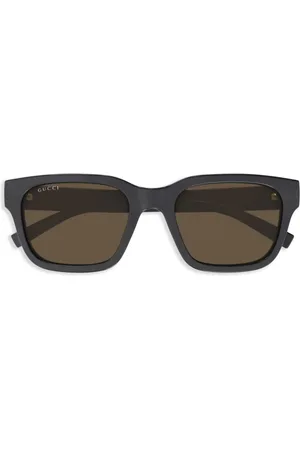 Gucci Lentes de sol con detalle Signature Web