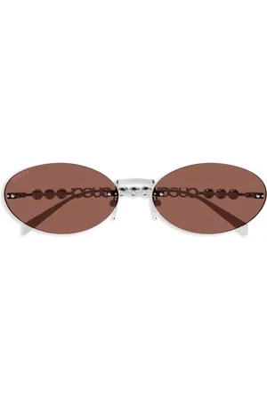 Gucci Lentes de sol con armazón ovalada