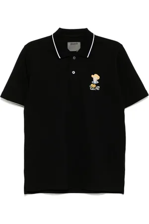 Musium Div. Playera tipo polo bordada