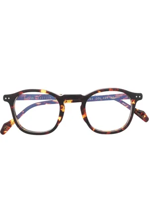 LESCA Lentes con armazón redonda estilo carey