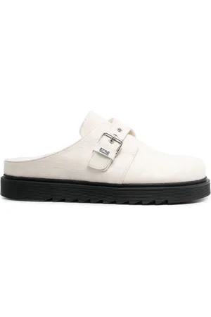GCDS Mules con monograma estampado