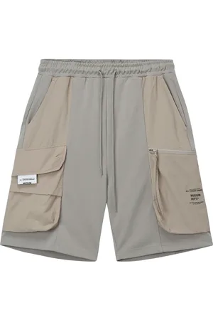 Musium Div. Shorts cargo con logo estampado