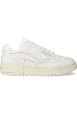Naked Wolfe Tenis con detalles de perforaciones