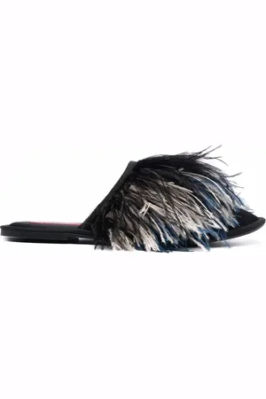 La DoubleJ Slippers con ribete de plumas