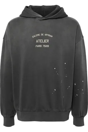 Musium Div. Hoodie con eslogan estampado