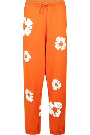 DENIM TEARS Pants con estampado Cotton Wreath