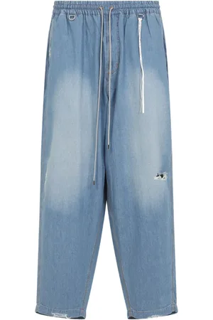 MASTERMIND JAPAN Jeans con calavera bordada