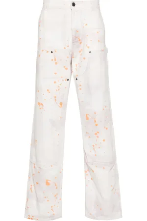 Msgm Pantalones rectos con motivo de salpicaduras de pintura