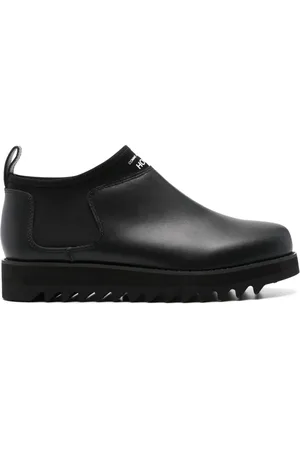 Comme des Garçons Botas con logo estampado