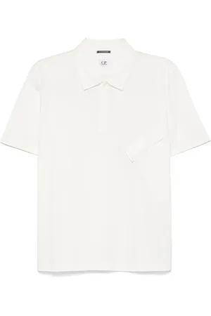 C.P. Company Playera tipo polo con aplique del logo