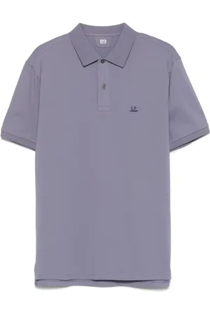 C.P. Company Playera tipo polo con parche del logo