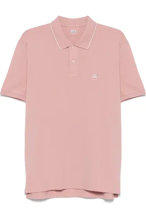 C.P. Company Playera tipo polo con parche del logo
