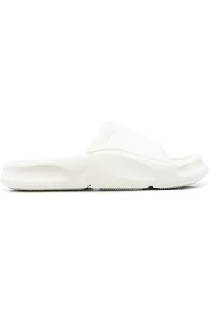 Heron Preston Flip flops slip-on con diseño moldeado