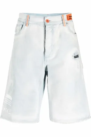 Heron Preston Shorts de mezclilla con efecto envejecido