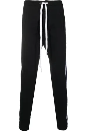 GREG LAUREN Pants con rayas laterales