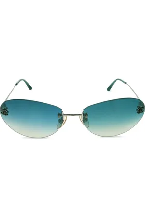 CHANEL Lentes de sol con armazón ovalada y logo CC 1990-2000