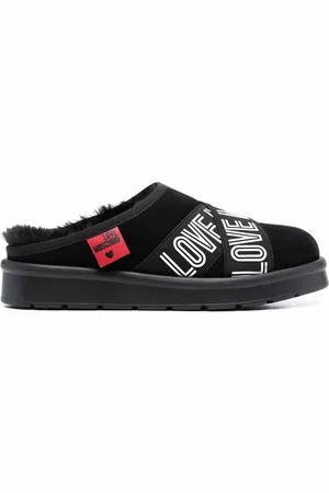 Moschino Mules con logo estampado
