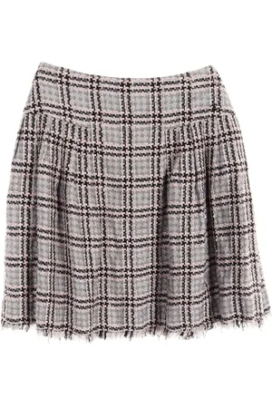 CHANEL Falda corta de tweed con motivo de cuadros 1986-1988