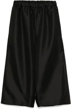 Comme des Garçons Pantalones anchos tipo gabardina